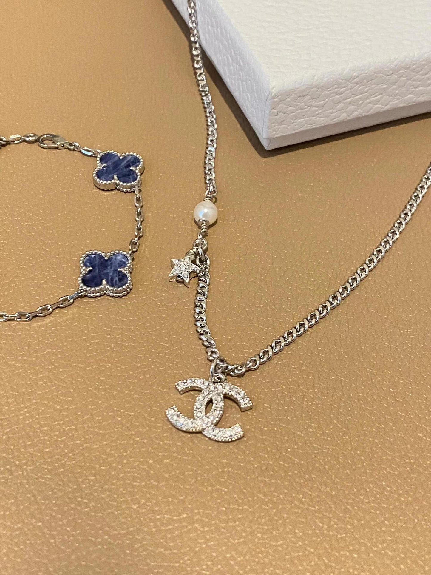 star and logo diamond necklace