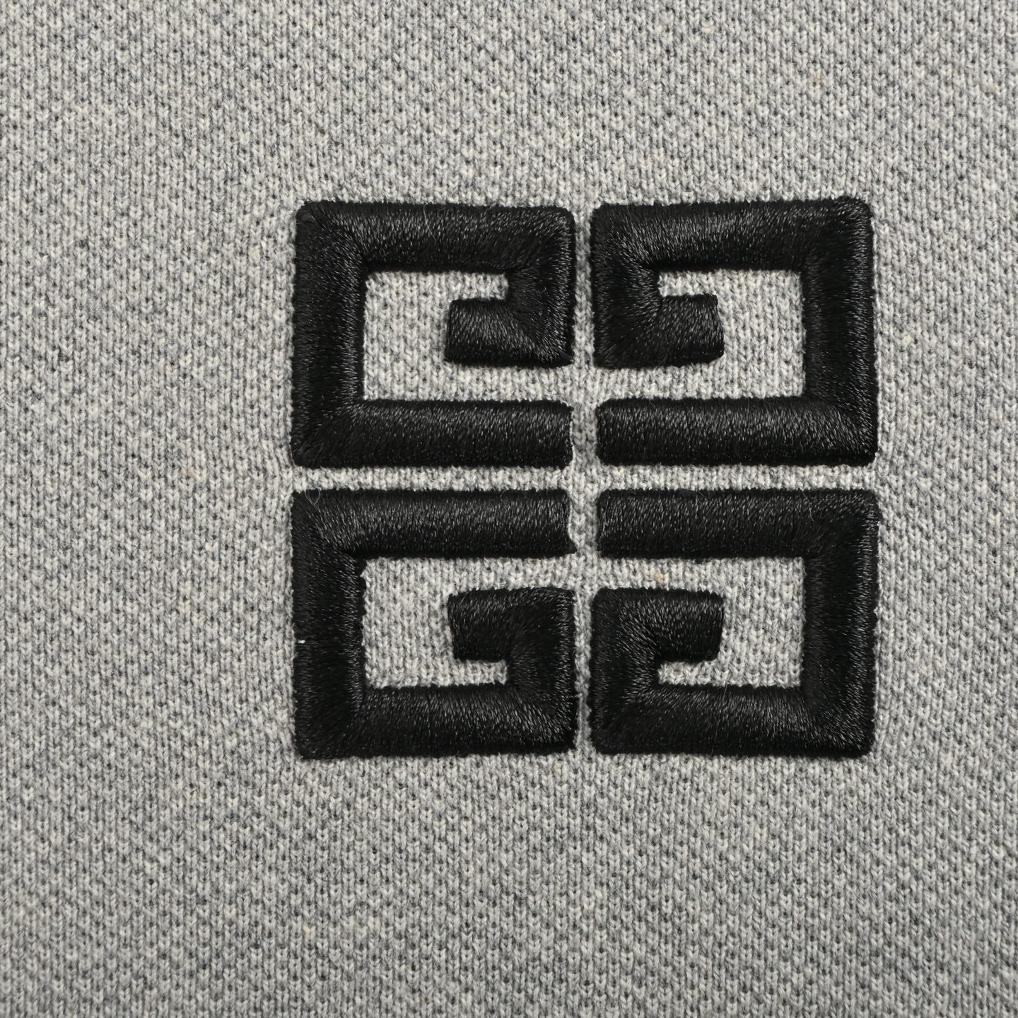 Half-zip chest logo short sleeves